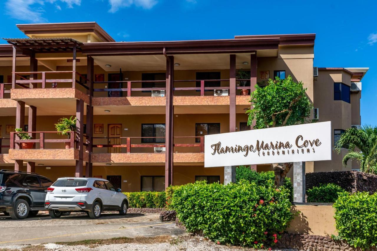 Warm Interiors And Orange Hues On Ground Floor In Front Of Beach Playa Flamingo Esterno foto
